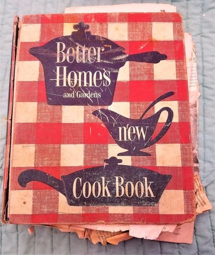 well worn old checkered cookbook