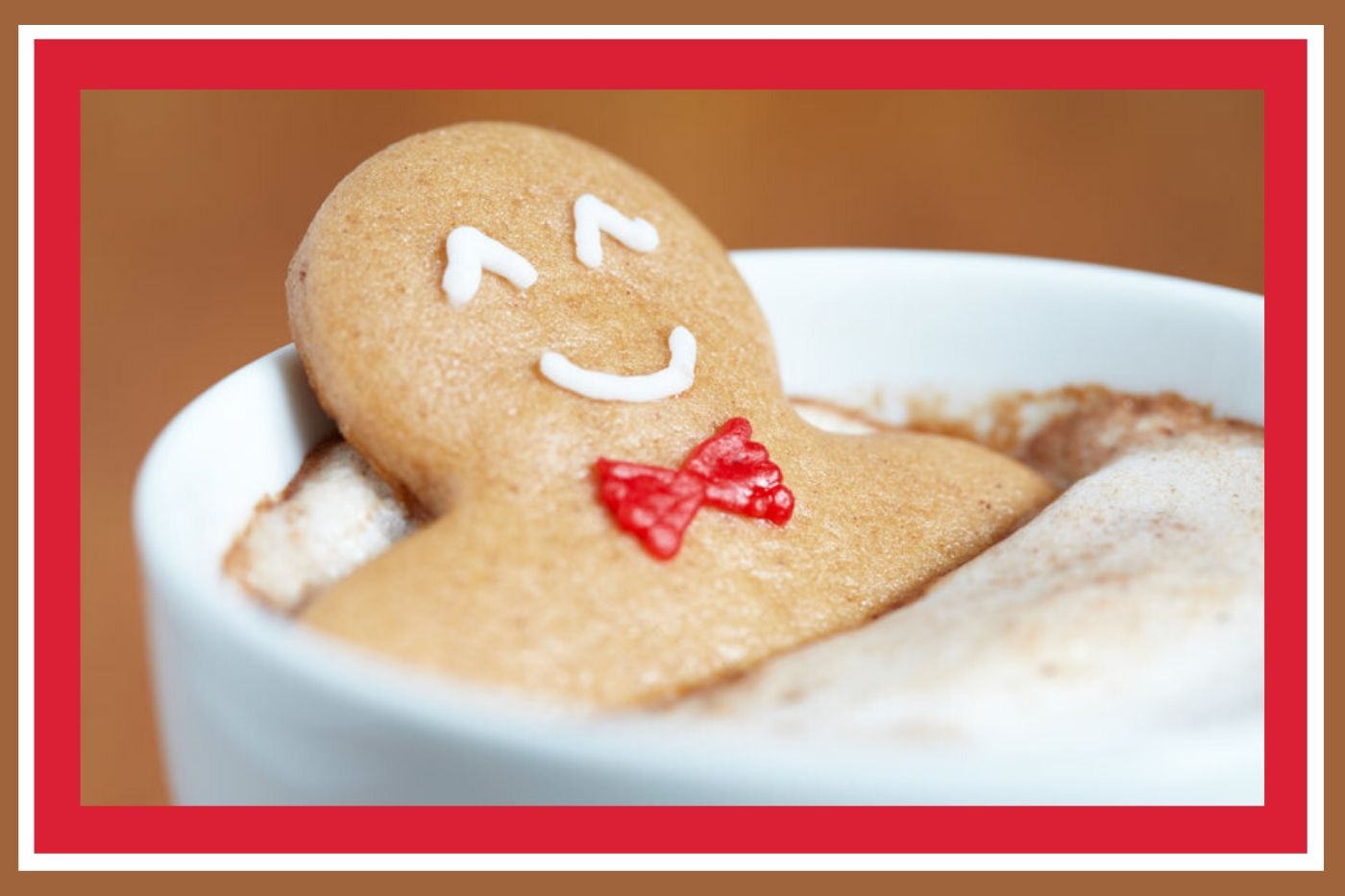 smiling gingerbread man in hot cocoa